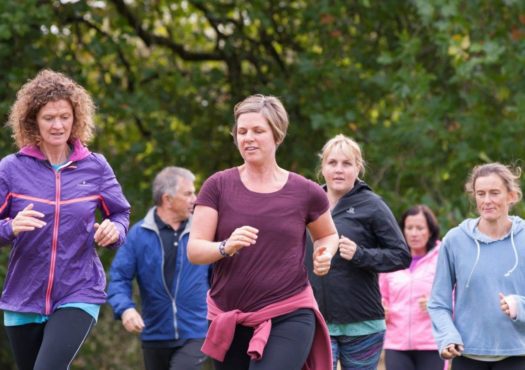 Running group with female lead