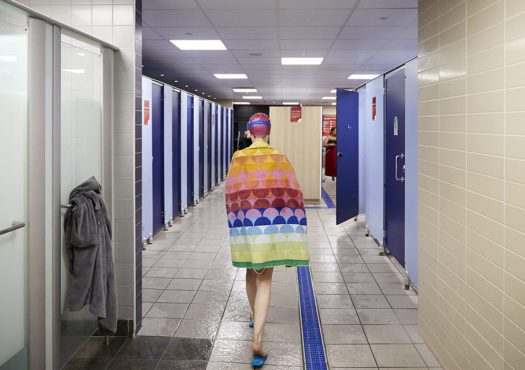 Woman in swimming pool changing rooms