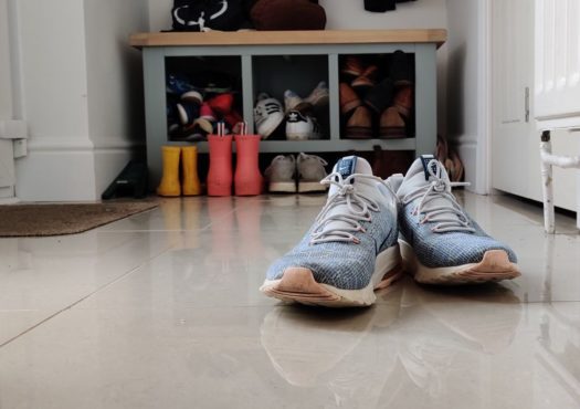 Pair of trainers in a hallway