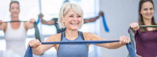 Photo of woman using resistance band