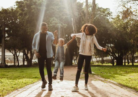 family walking in park