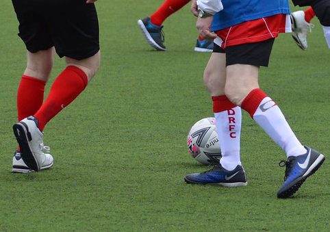 men playing walking football