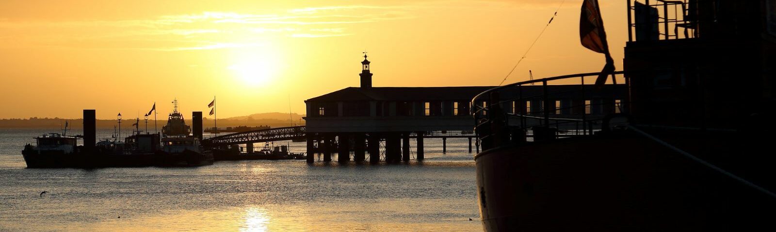 sunrise over pier