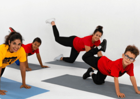 family stretching on yoga mats