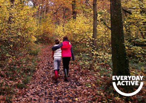 people walking in woods