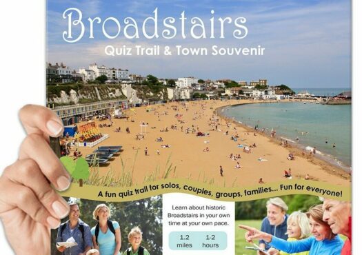 a hand holding the Broadstairs quiz trail book