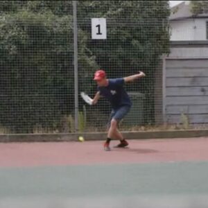 Liam playing tennis