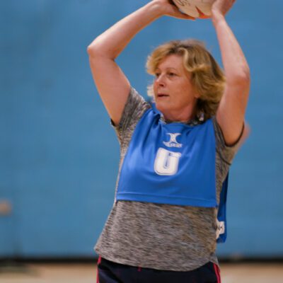 Christine holding a netball