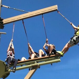 Photo of people on high ropes course