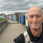 Paul Dennington at beach huts