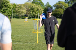 Playing disc golf