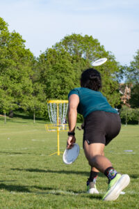 Playing disc golf