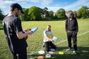 Playing disc golf